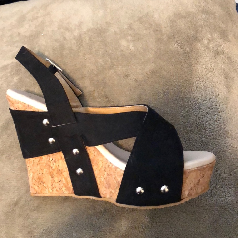 Open toe wedges.